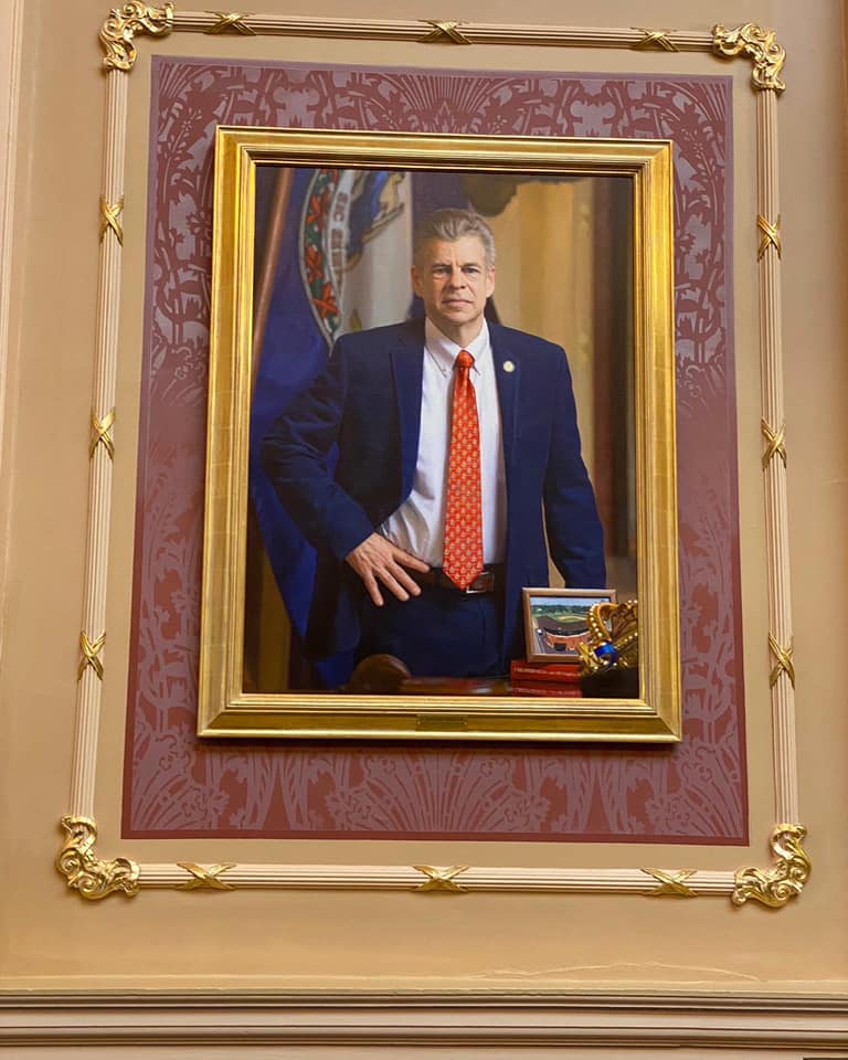 Cox portrait on wall